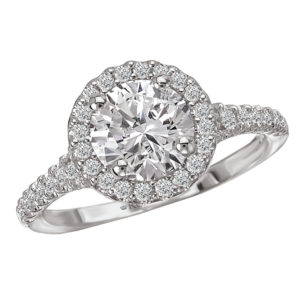 Round Halo Diamond Romance Engagement Ring in 14kt White Gold. (D.1/3 carat total weight) This item is a SEMI-MOUNT and it comes with NO CENTER STONE as shown but it will accommodate a 6.5mm round center stone.