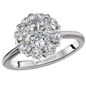 This elegant ring features a round halo of sparkling diamonds set in high polished 14k white gold. (D 1/2 carat total weight) This ring is a SEMI-MOUNT and it comes with NO CENTER STONE as shown but it will accommodate a 6.5mm round center stone