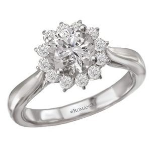 Flower Design Halo Ring in 18kt White Gold. (D 1/3 carat total weight) This item is a SEMI-MOUNT and it comes with NO CENTER STONE as shown but it will accommodate a 6.5mm round center stone.