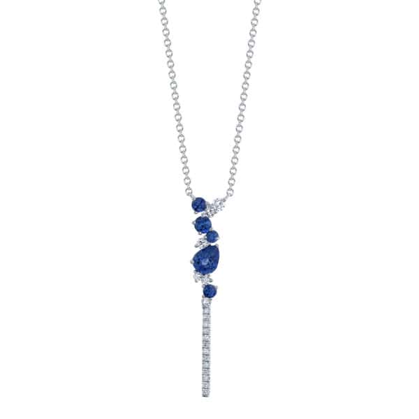 vertical bar with shimmering white diamonds and five assorted shaped sparkling blue sapphires.