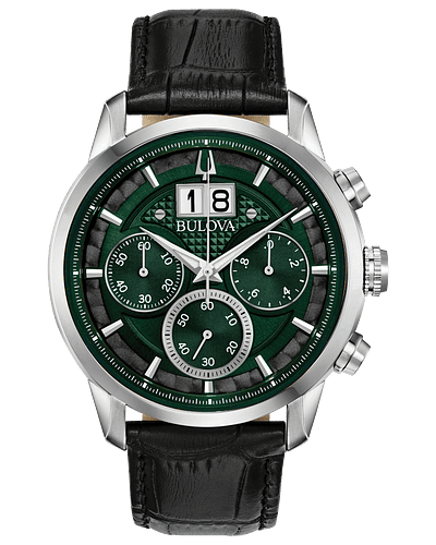 Bulova Sutton Six-hand chronograph with silver tone stainless steel case and black leather strap. Deep forest green and black dial, featuring an oversized date window at the 12 o'clock position. Watch features a domed mineral crystal, quartz movement, and water resistance to 30 meters