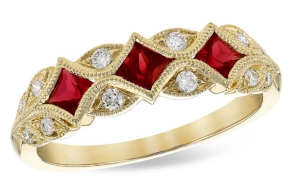 Ruby and diamond milgrain leaf look 14kty band looks like set on point. The Ruby is .55ctw and the total weight of the stones is .70ct